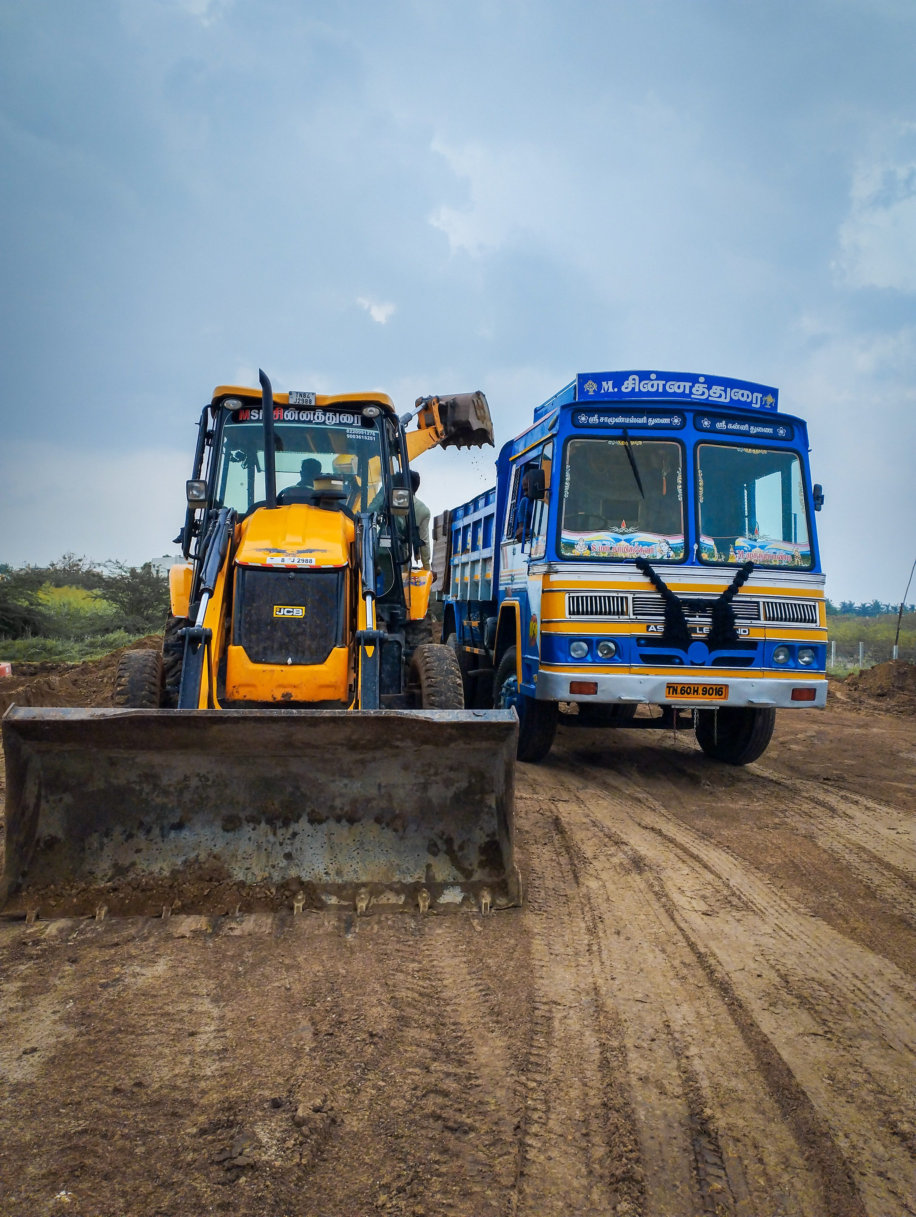 Workers applying advanced roof and wall waterproofing